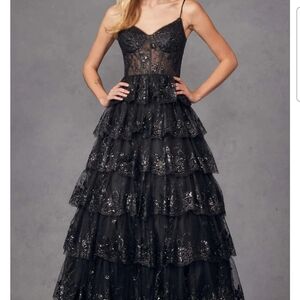 Glittering Black Tiered Tulle Ball Gown with Sheer Corset Bodice